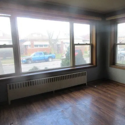 Buy this 4 bed house on 1515 East 85th Street in Chicago, IL 60617