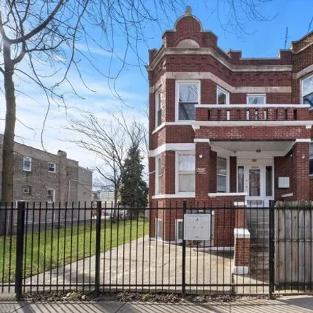 Buy this 8 bed house on 1036 North Springfield Avenue in Chicago, IL 60651