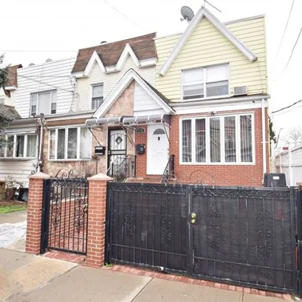 Buy this 3 bed house on 91-12 88th Street in New York, NY 11421