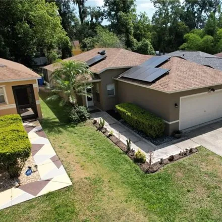 Rent this 3 bed house on 11718 Mango Groves Boulevard in Mango Hills, Hillsborough County