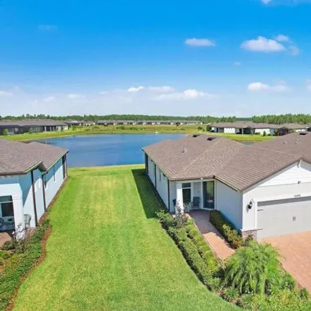 Buy this 2 bed house on Blue Crush Bend in Pasco County, FL 34638