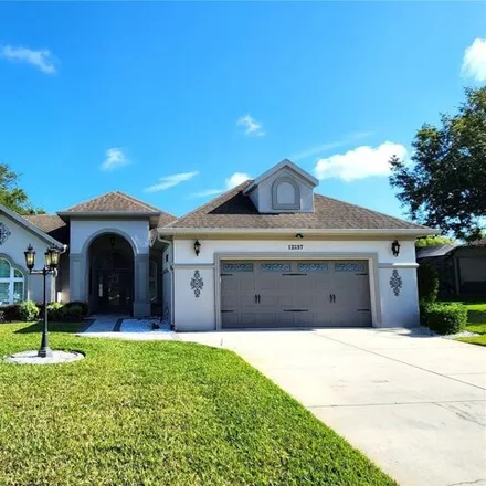 Buy this 3 bed house on 12181 Padron Boulevard in Spring Hill, FL 34609