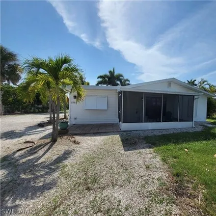 Rent this 3 bed house on 2361 Baybreeze Street in Saint James City, Lee County