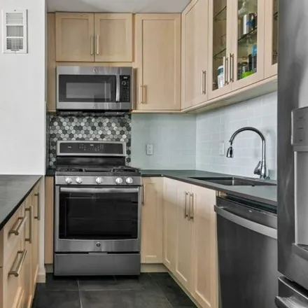 Buy this studio apartment on 80 Beekman Street in New York, NY 10038