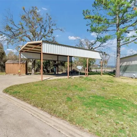 Buy this studio house on 466 Brazos Harbor Court in Granbury, TX 76048