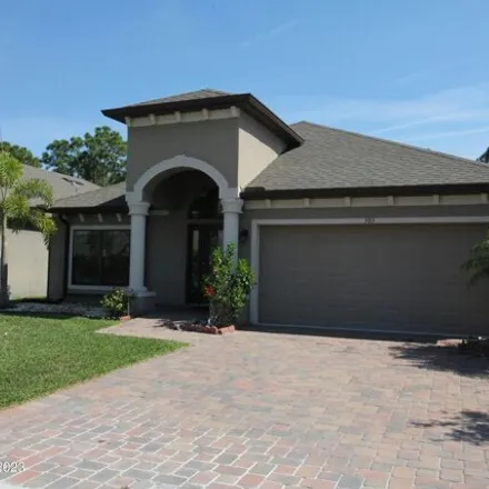 Rent this 3 bed house on 939 Musgrass Circle in West Melbourne, FL 32904