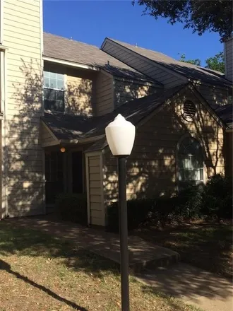 Rent this 2 bed townhouse on Bel Aire Crest in Irving, TX 75084