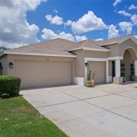 Buy this 4 bed house on 5135 Riva Ridge Dr in Wesley Chapel, Florida