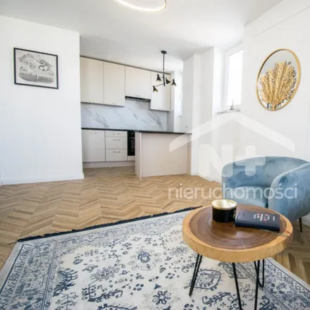 Buy this 3 bed apartment on Dom nad Rozchodnikiem in Grodzieńska 34, 03-750 Warsaw