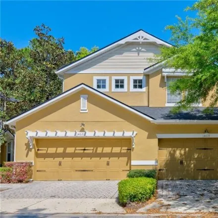 Rent this 4 bed house on 14001 Sparkling Cove Lane in Lakeside Village, FL 34786