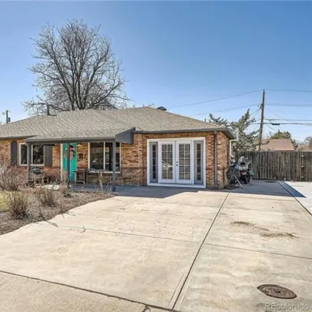 Buy this 4 bed house on 749 Tucson Street in Aurora, CO 80045