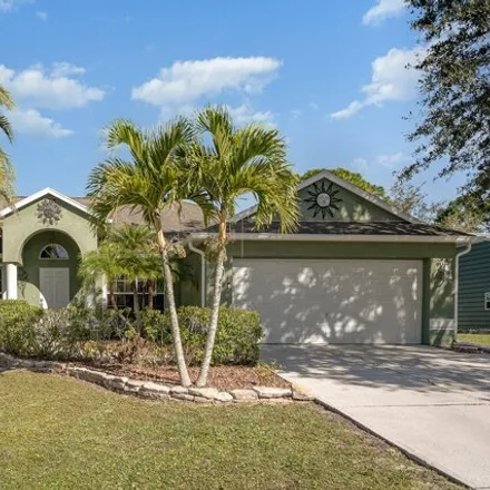 Buy this 3 bed house on 897 Sanford Street Southwest in Palm Bay, FL 32908