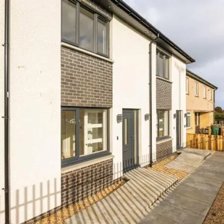 Buy this 2 bed townhouse on Gracemount High School in Lockerby Cottages, City of Edinburgh