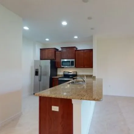 Rent this 3 bed apartment on 13954 Snapper Fin Lane in New Tampa, Tampa