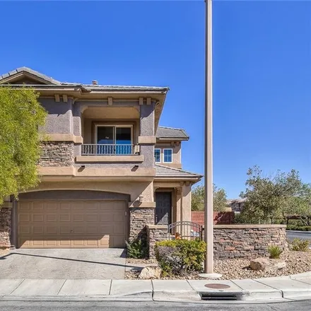 Buy this 4 bed loft on 10478 Harvest Wind Drive in Summerlin South, NV 89135