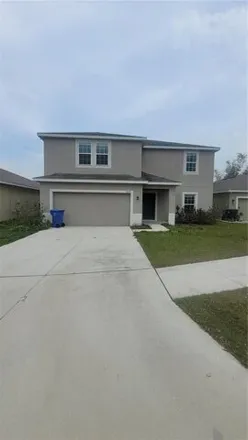 Rent this 4 bed house on 10118 Candleberry Woods Drive in Alpine, Hillsborough County