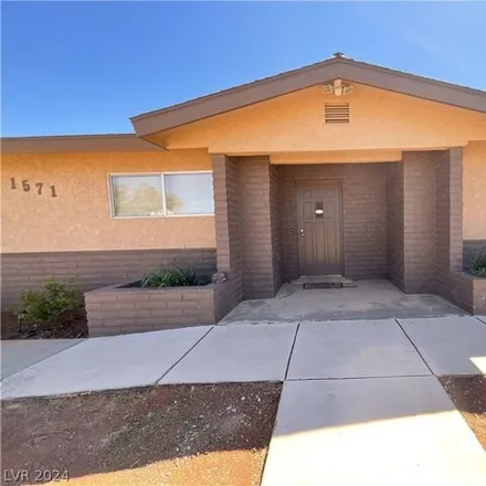 Rent this 3 bed house on 1575 Turf Drive in Henderson, NV 89002
