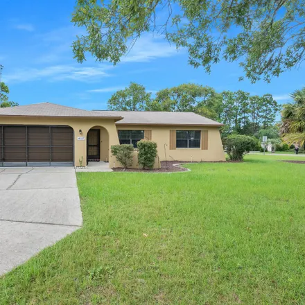 Buy this 2 bed house on 14037 Trollman Street in Spring Hill, FL 34609