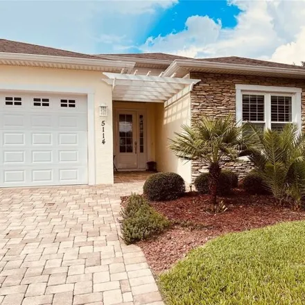 Buy this 3 bed house on 5114 Addison Shore Way in Wildwood, FL 32162