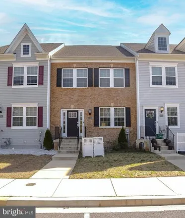 Rent this 4 bed townhouse on Englewood Way in Mill Cove Manor, Lexington Park