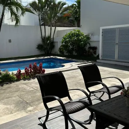 Buy this 4 bed house on Côt Winehood in Boulevard Cumbres SM310 M109 L 4 BLVD. CUMBRES RESIDENCIAL Cumbres Residencial, 77560 Cancún