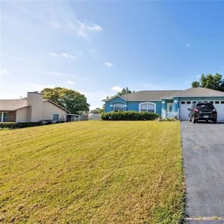 Buy this 4 bed house on 1389 Section Line Trail in Deltona, FL 32725