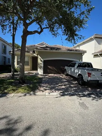 Buy this 3 bed house on 1149 Center Stone Lane in Riviera Beach, FL 33404