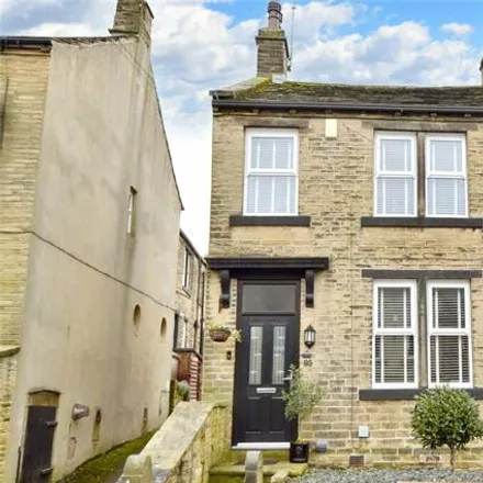 Buy this 3 bed townhouse on Thornhill Grove in Calverley, LS28 5PB