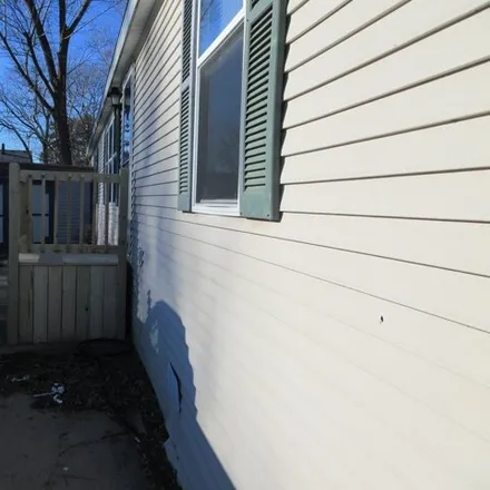 Buy this studio apartment on 43313 Clementine Drive in Clinton Charter Township, MI 48036
