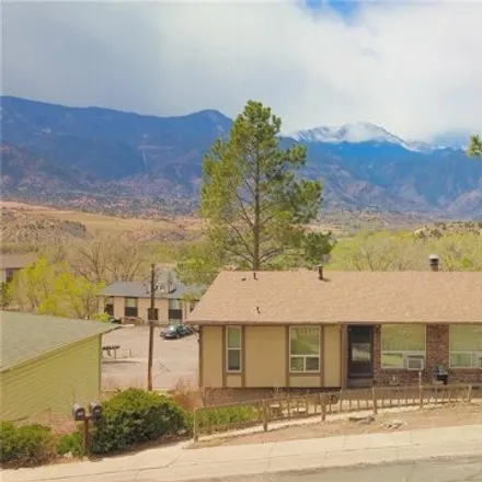 Buy this 4 bed house on 618 Crown Ridge Drive in Colorado Springs, CO 80904