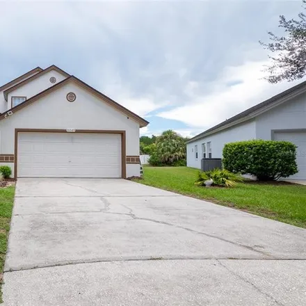 Buy this 4 bed house on 16501 Coopers Hawk Avenue in Lake County, FL 34714