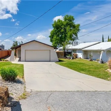 Rent this 3 bed house on 1155 Tourmaline Avenue in Mentone, San Bernardino County