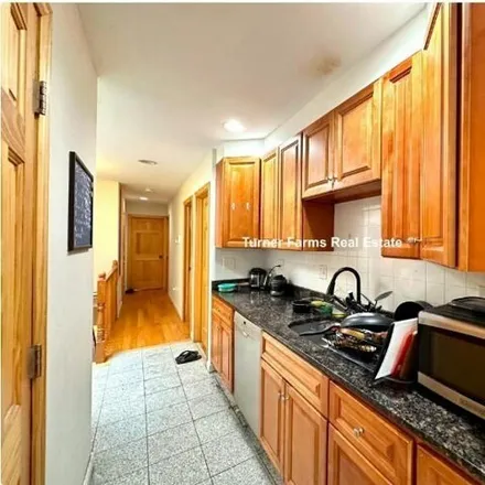 Rent this 4 bed apartment on 10 Moreland Street in Boston, MA 02119