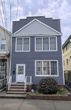 Rent this 4 bed house on 87 McAdoo Avenue in Greenville, Jersey City