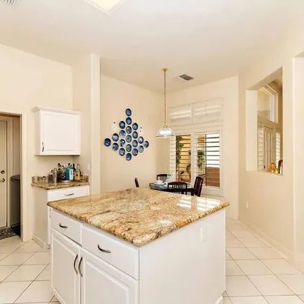 Rent this 3 bed apartment on Grape Arbor Avenue in Palm Desert, CA