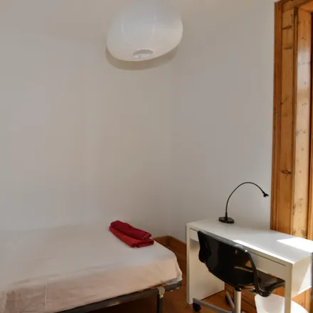 Rent this 4 bed room on Taberna Albricoque in Rua dos Caminhos de Ferro, 1100-108 Lisbon