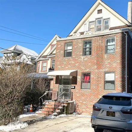 Buy this 9 bed house on 147-11 35th Avenue in New York, NY 11354