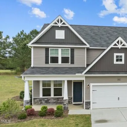 Buy this 4 bed house on 8821 Arched Wing Way in Willow Spring, North Carolina