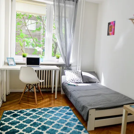 Rent this 4 bed room on Hoża 36 in 00-516 Warsaw, Poland
