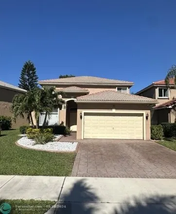 Buy this 4 bed house on 3767 Pebblebrook Court in Coconut Creek, FL 33073