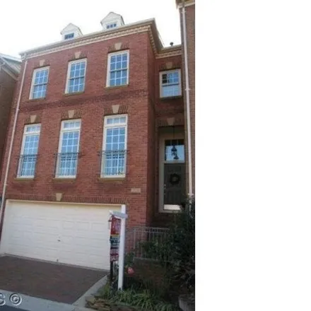Rent this 4 bed townhouse on 704 Arch Hall Lane in Alexandria, VA 22314