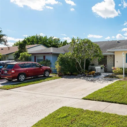 Buy this 3 bed townhouse on 3910 Wilshire Street in North Palm Beach, FL 33403
