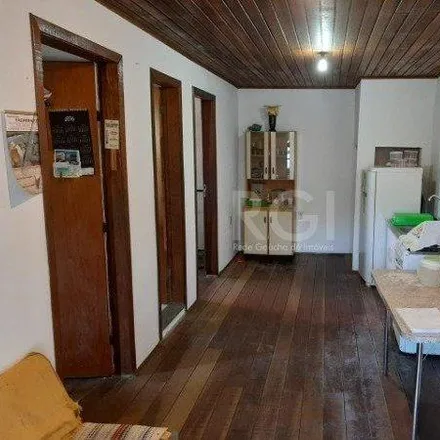 Buy this 2 bed house on Rua Ângelo Passuelo in Vila Nova, Porto Alegre - RS
