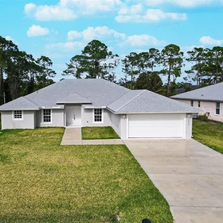 Buy this 3 bed house on 1679 Southwest Levato Avenue in Port Saint Lucie, FL 34953