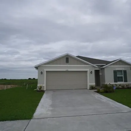 Rent this 4 bed house on 2090 Ficus Street in Mascotte, Lake County
