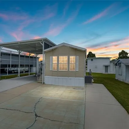 Buy this studio apartment on 5088 Southshore Drive in Polk County, FL 33868