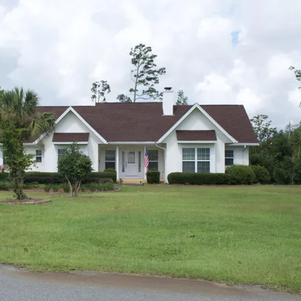 Buy this 4 bed house on 2535 Woods View Drive in Jackson County, FL 32446