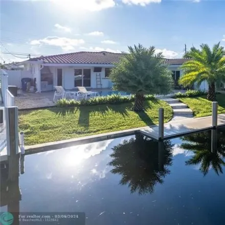 Rent this 3 bed house on 6261 Northeast 20th Terrace in Imperial Point, Fort Lauderdale