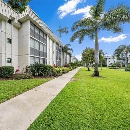 Rent this 2 bed condo on HLV Clubhouse in 788 Park Shore Drive, Naples