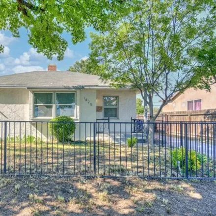 Buy this 3 bed house on 1855 East Cambridge Avenue in Fresno, CA 93703